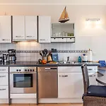 Апартаменты Terrassen-fewo-heimathaven-direkt-am-ostseestrand
