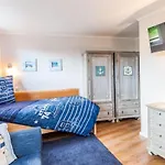 Апартаменты Terrassen-fewo-heimathaven-direkt-am-ostseestrand *